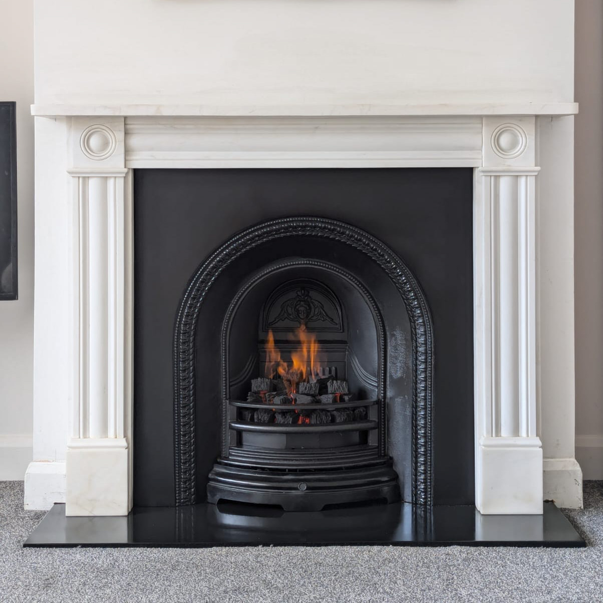 White marble "Roundel" mantel, "Better Hearth Arch" insert, gas fire